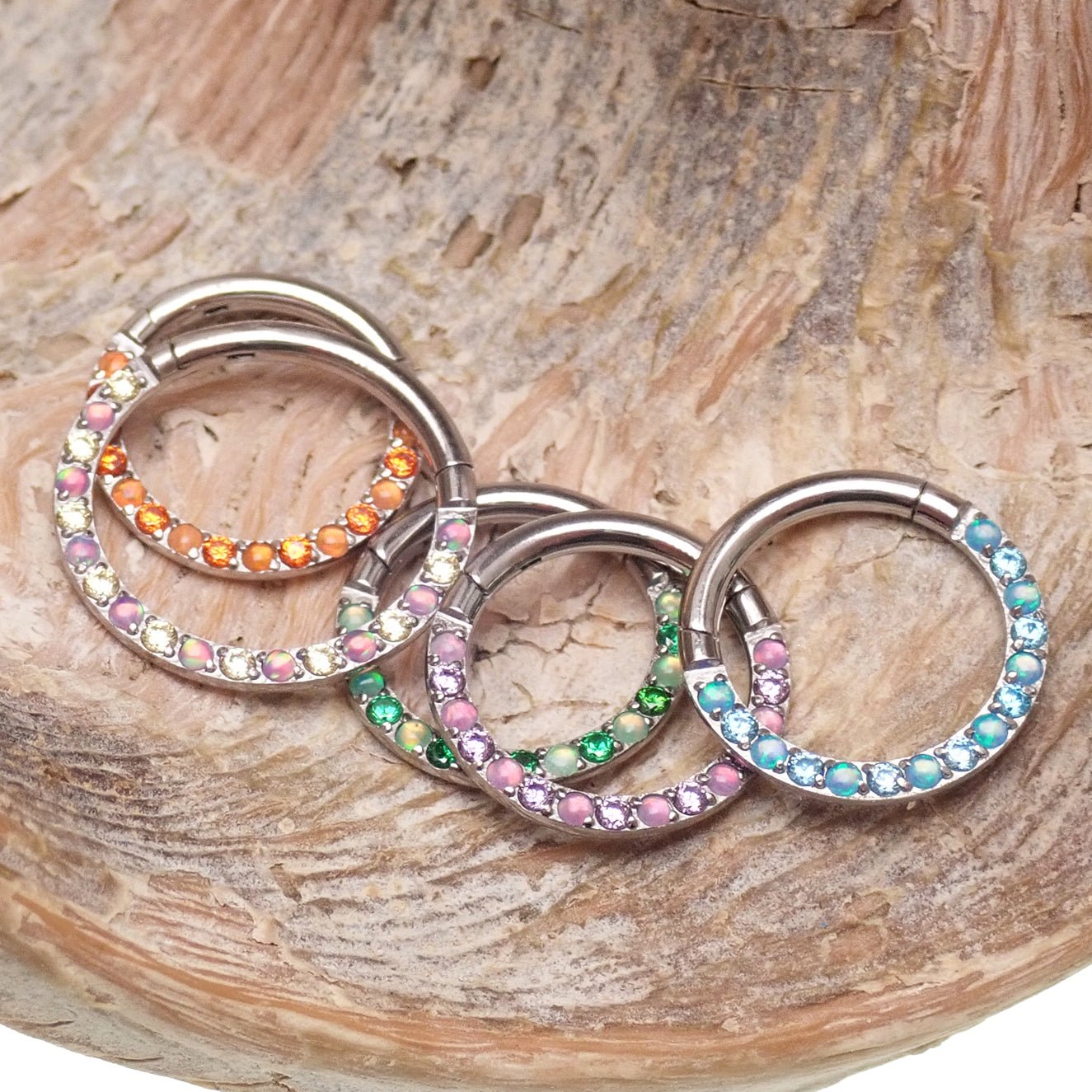 Green opal and CZ front titanium clicker body jewelry in 16g with 8mm decorative stone for piercings.