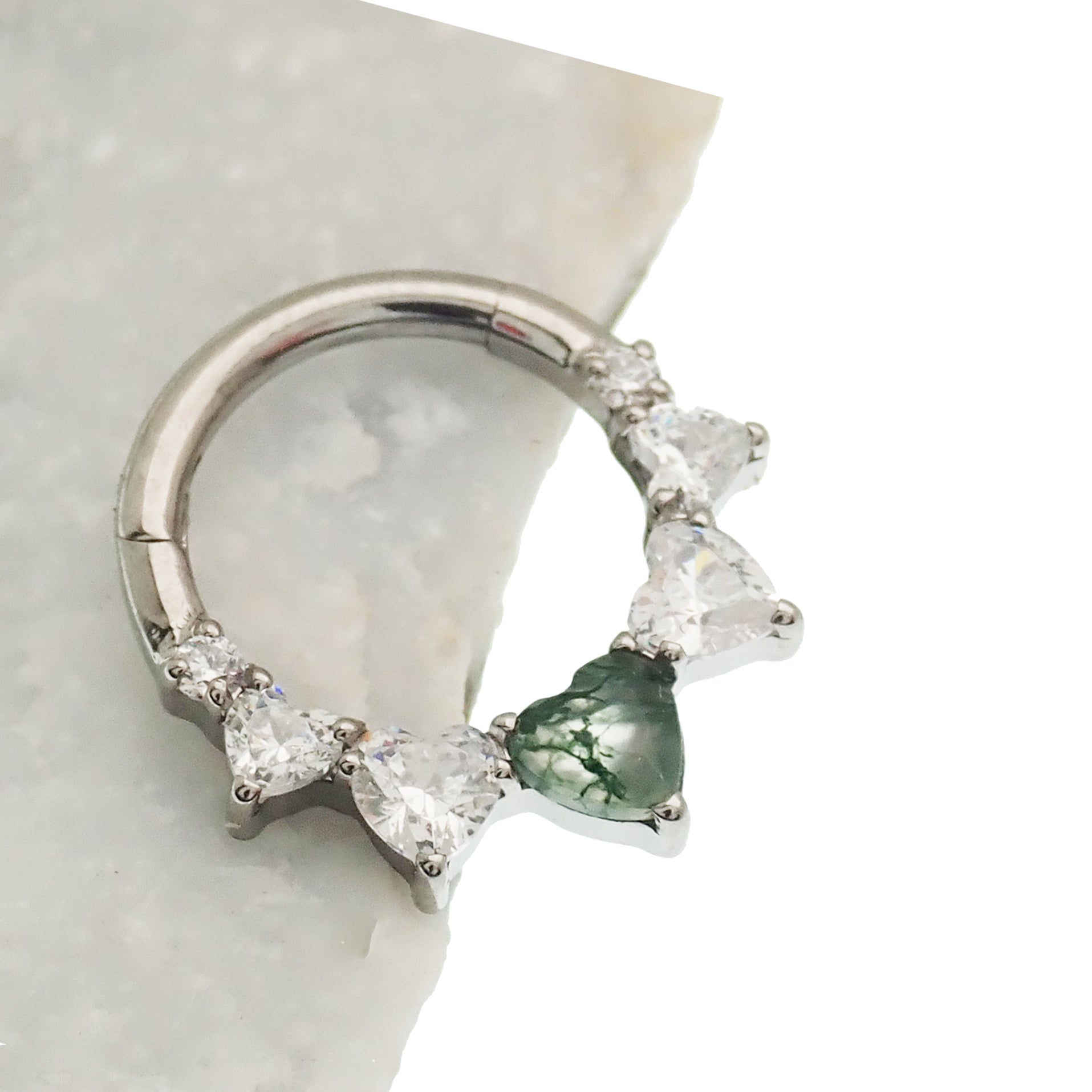 Moss Agate and CZ heart hinged clicker body jewelry in 16g, featuring a decorative gemstone and elegant design.