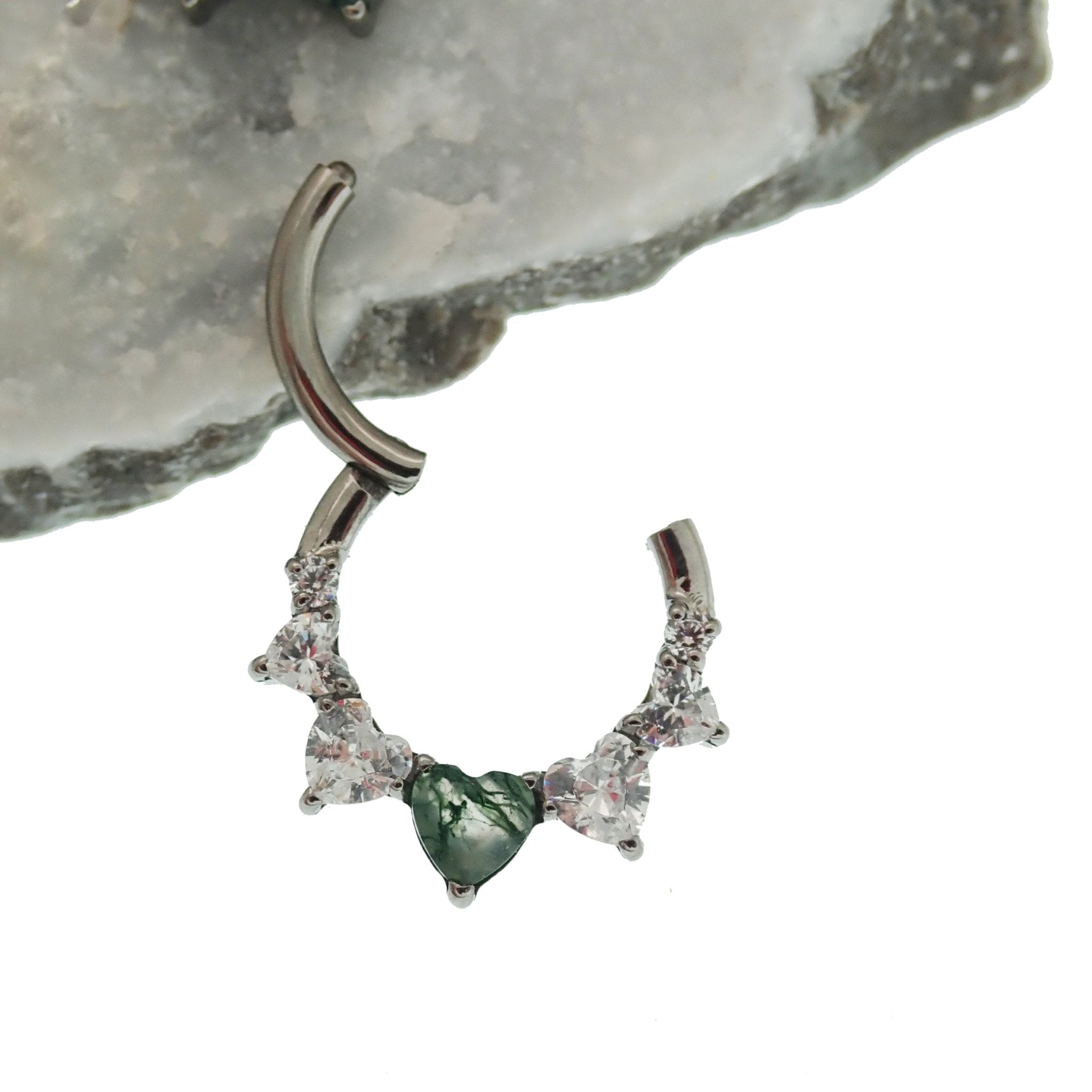Hinged 16g body clicker featuring moss agate and CZ accents in a heart shape, designed for body jewelry piercing.