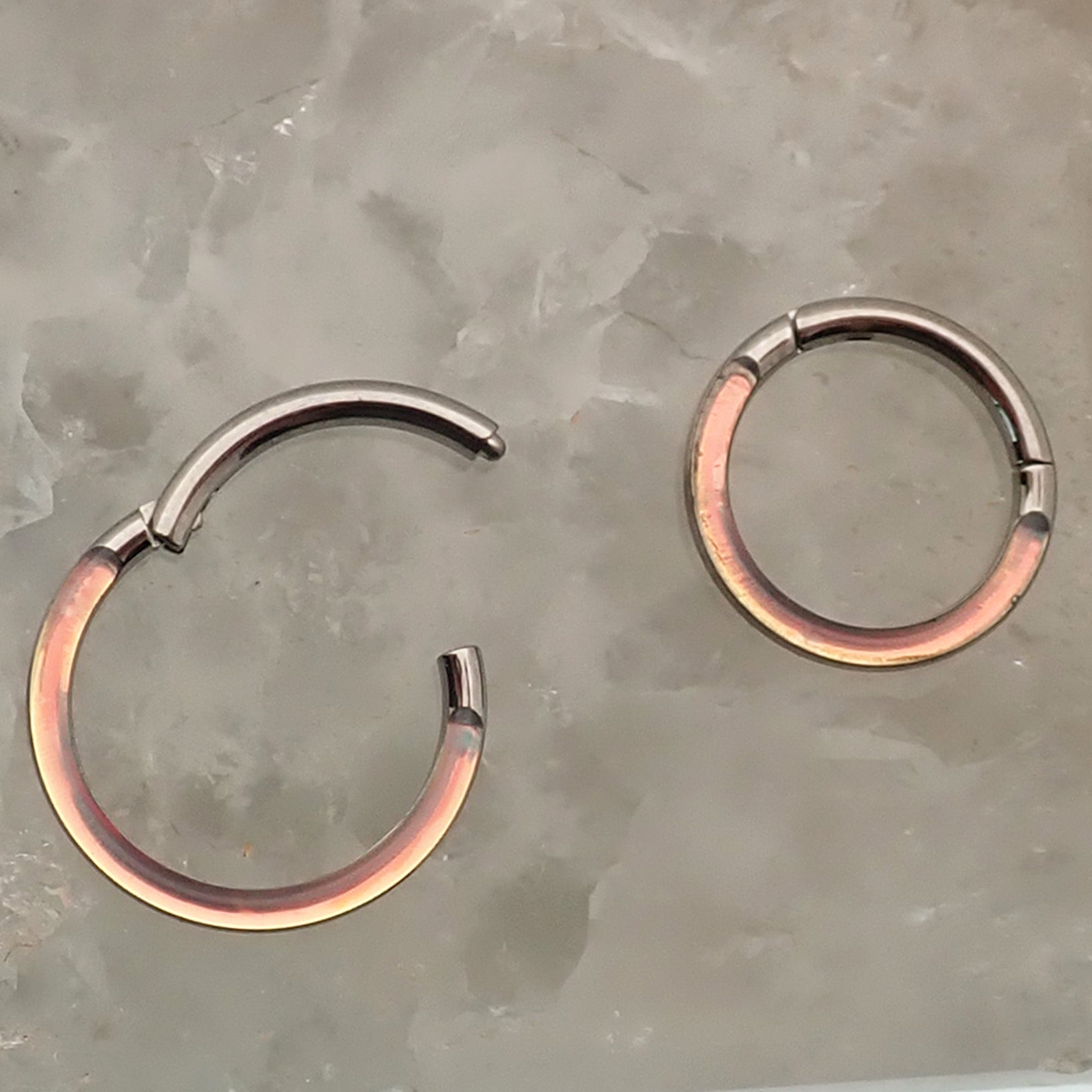 Photochromic epoxy clicker ring 16g by Body Clickers Body Jewelry, featuring an 8mm adjustable body jewelry design.