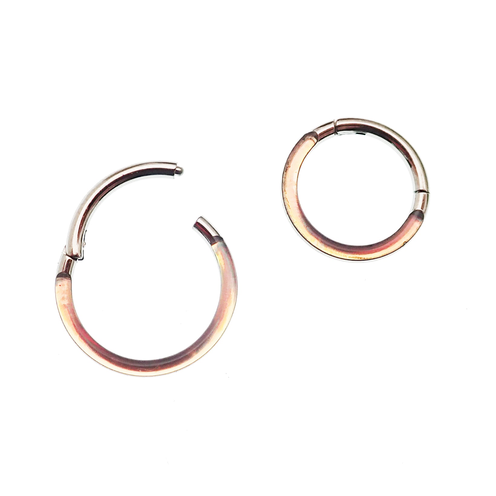 Photochromic epoxy clicker ring by Body Clickers Body Jewelry, 16g, with an 8mm diameter and color-changing feature for body piercing.