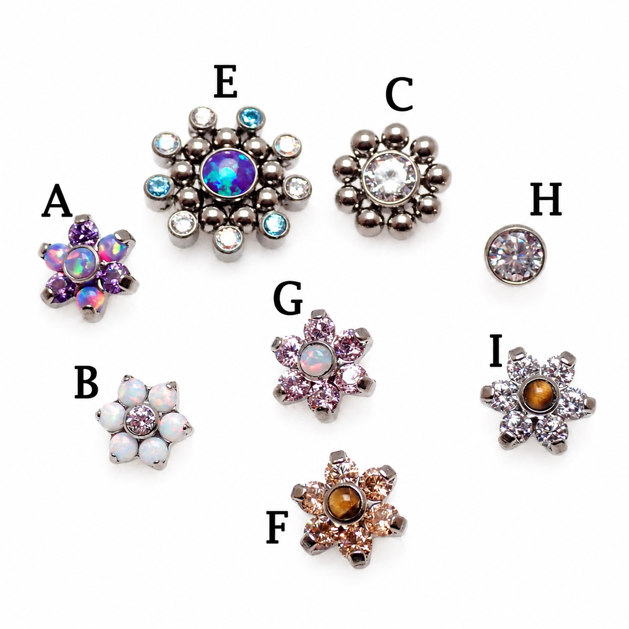 Dermal titanium attachments for body jewelry, 14g gauge, by Body Clickers, shown in close-up of the jewelry pieces.