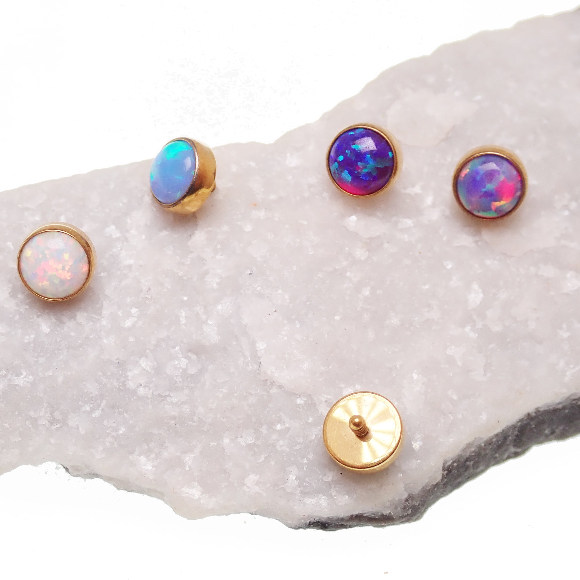 Titanium loose implant attachment with 4mm PVD gold flat opal top for body jewelry, 16g/0.9mm thread from Body Clickers.