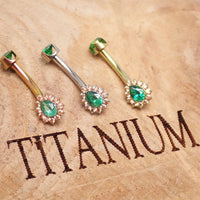 Pink titanium internally threaded belly ring in 14g with a sleek design from Body Clickers Body Jewelry.
