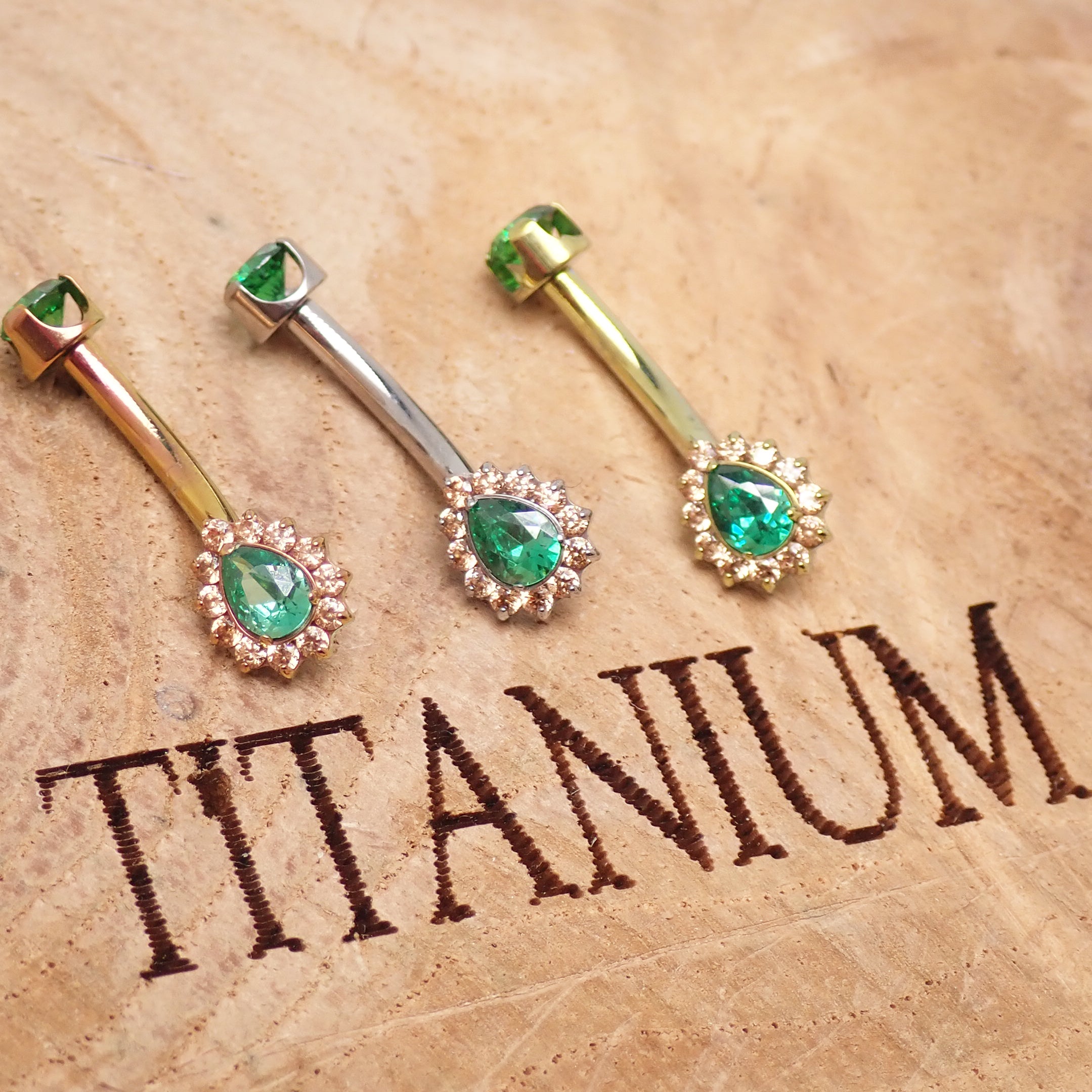 Pink titanium internally threaded belly ring in 14g with a sleek design from Body Clickers Body Jewelry.