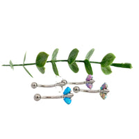 Titanium butterfly navel belly ring by Body Clickers Body Jewelry, 14g belly piercing with decorative butterfly design.