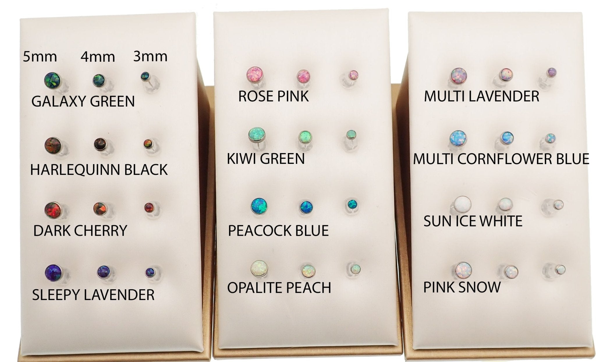 Black fire opal push fit threadless top body jewelry in implant-grade titanium by Body Clickers.