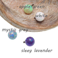 Black harlequin 5mm fire opal titanium ball body jewelry by Body Clickers, 14g, suitable for body piercings.