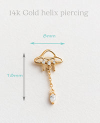14k solid gold UFO titanium flatback body piercing by Body Clickers Body Jewelry, 20g size with 6mm diameter.