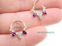 Gold PVD titanium clicker piercing with kiwi opal and amethyst gemstones, 16g body jewelry by Body Clickers.