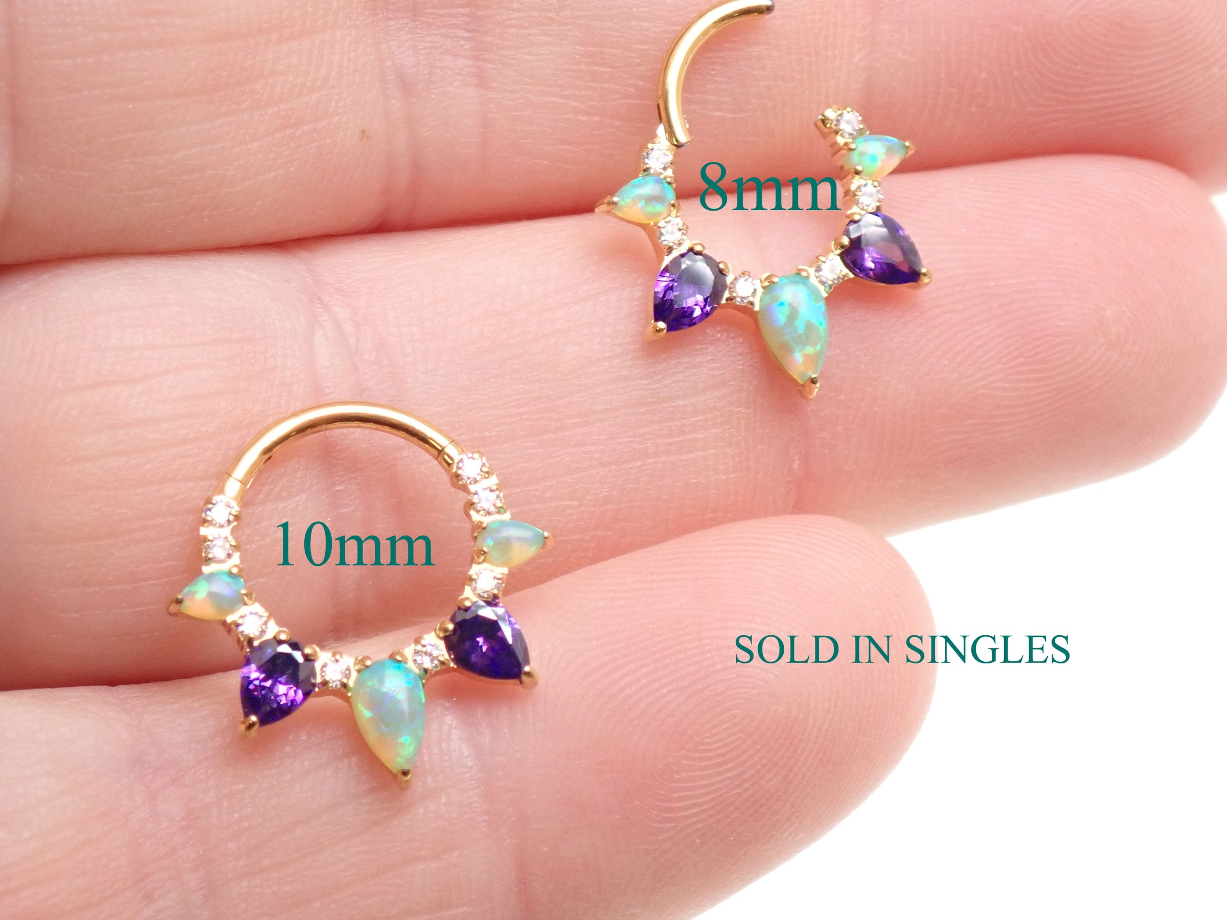 Gold PVD titanium clicker piercing with kiwi opal and amethyst gemstones, 16g body jewelry by Body Clickers.