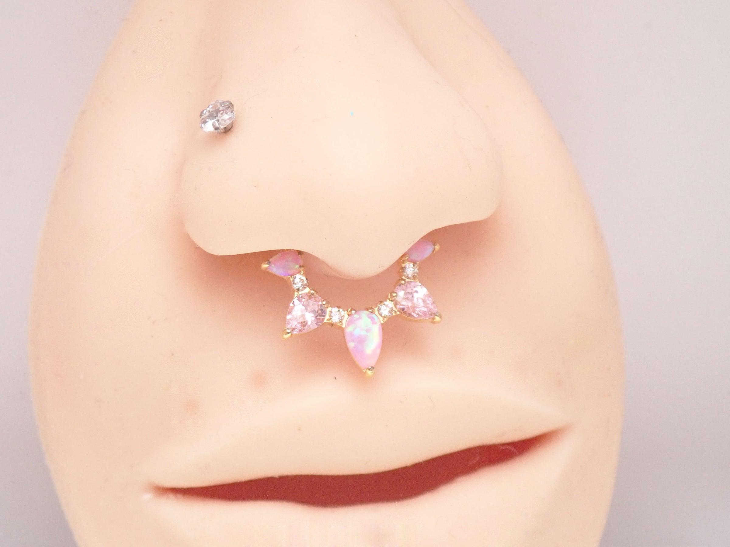 Pink opal PVD gold titanium clicker body jewelry, 8mm, stylish piercing designed for body jewelry enthusiasts.