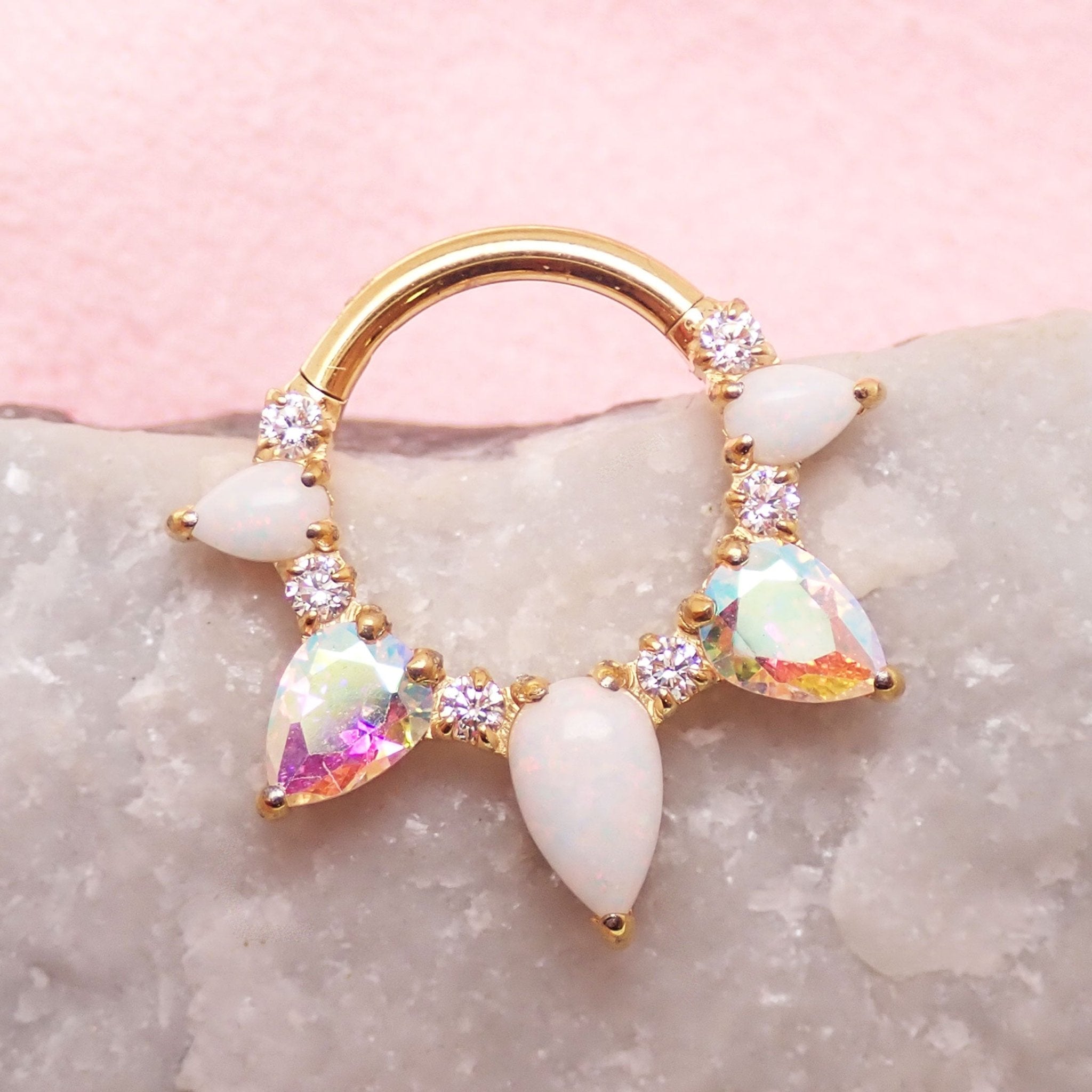 White opal PVD gold implant titanium clicker piercing in 16g body jewelry with 8mm opal stone and clicker design.