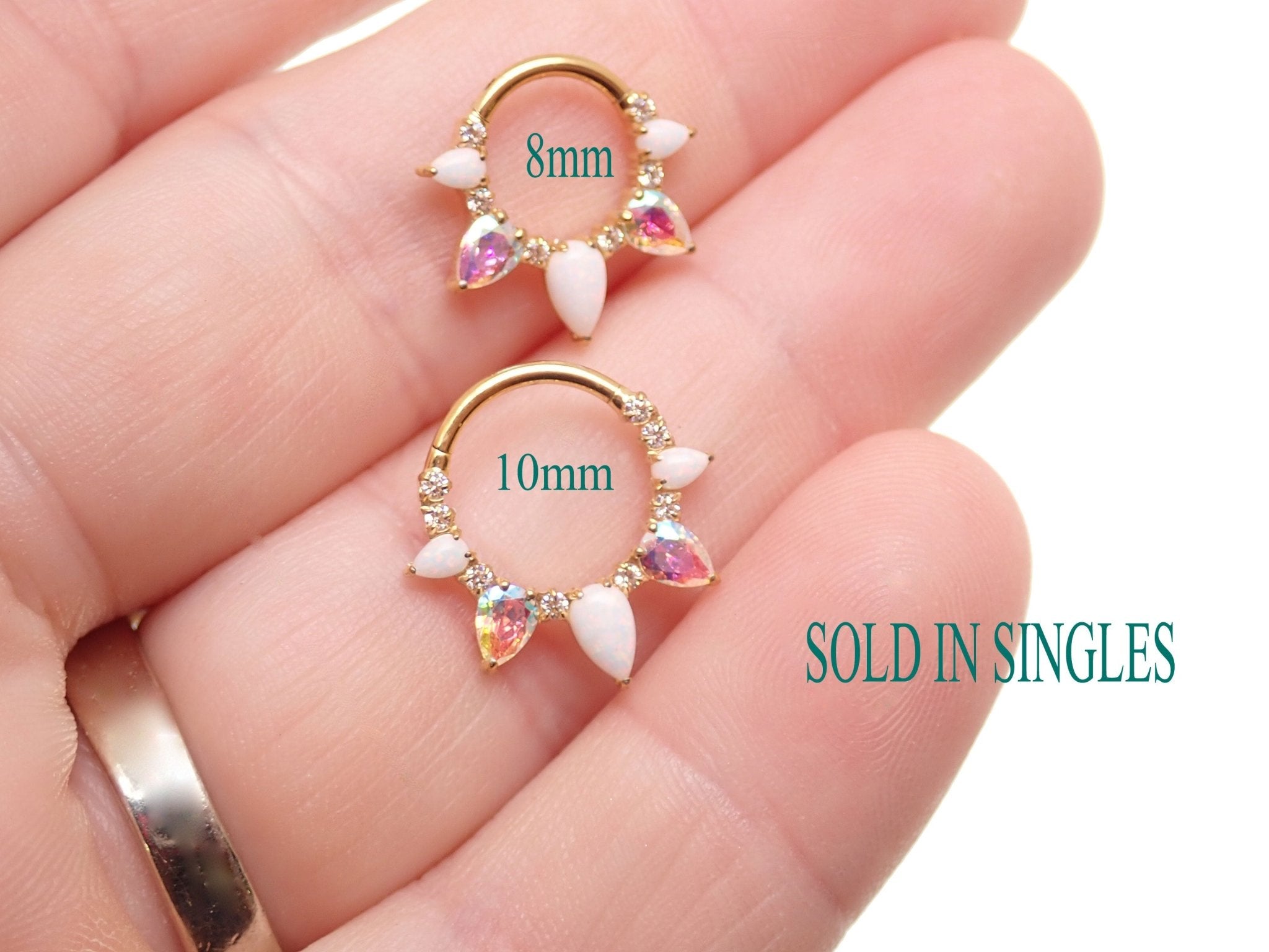 White opal PVD gold implant titanium clicker piercing in 16g body jewelry with 8mm opal gemstone for ear or nose piercing.