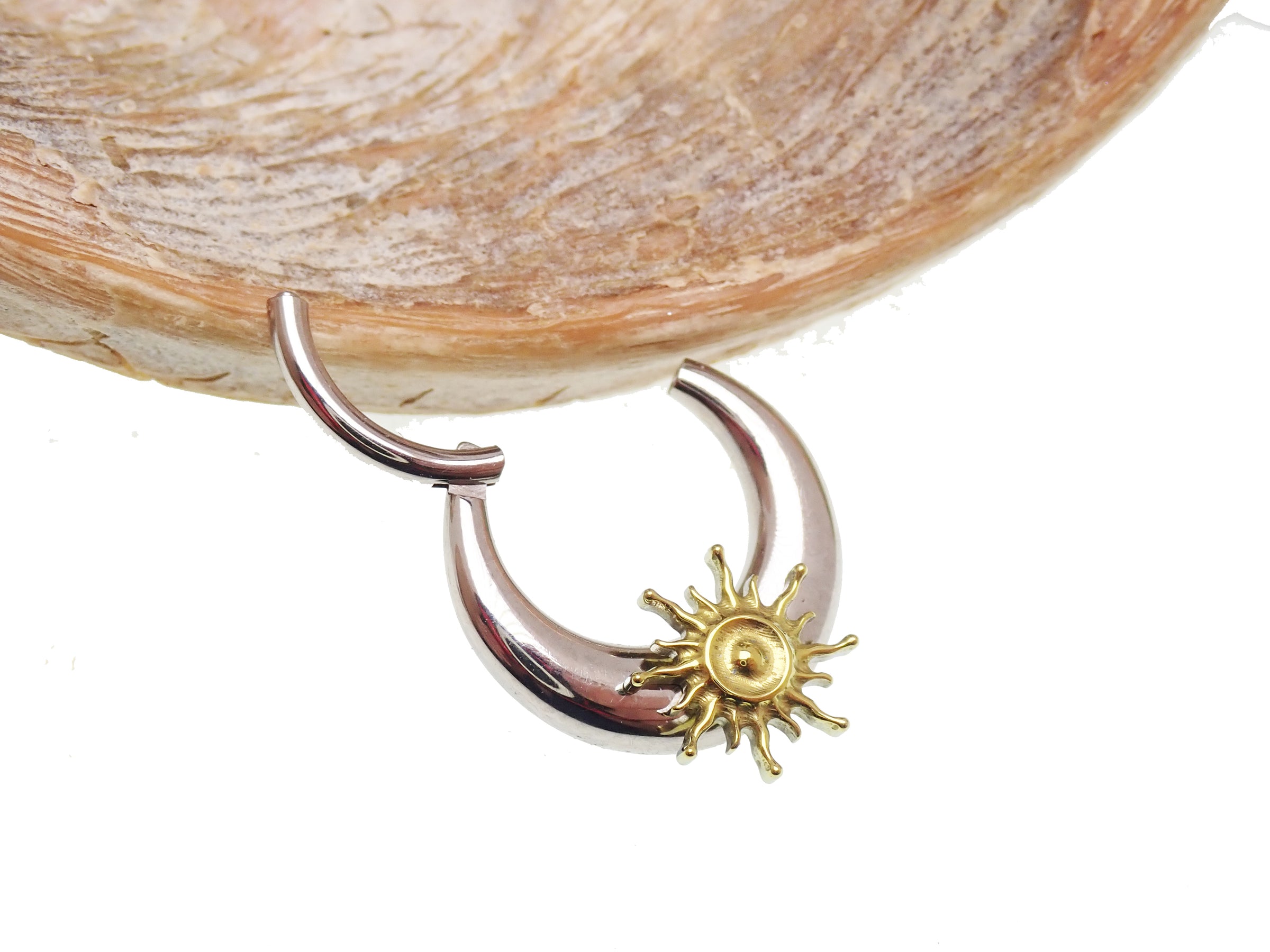 Titanium Sunburst Implant Clicker in 16G and 14G with 8mm diameter, body jewelry featuring intricate sunburst design.