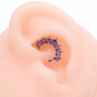 Amethyst CZ 16G titanium clicker body jewelry for daith or septum piercings, featuring a stylish design by Body Clickers.