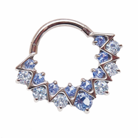Blue CZ titanium clicker for daith or septum, 16G, from Body Clickers Body Jewelry, featuring a sleek implant design.
