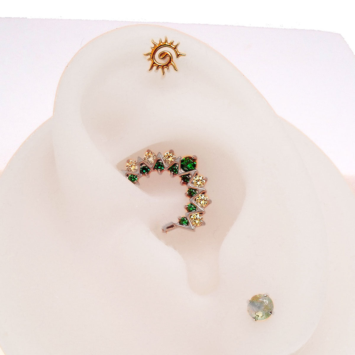 Green CZ 16G titanium clicker jewelry for daith and septum piercings by Body Clickers Body Jewelry.