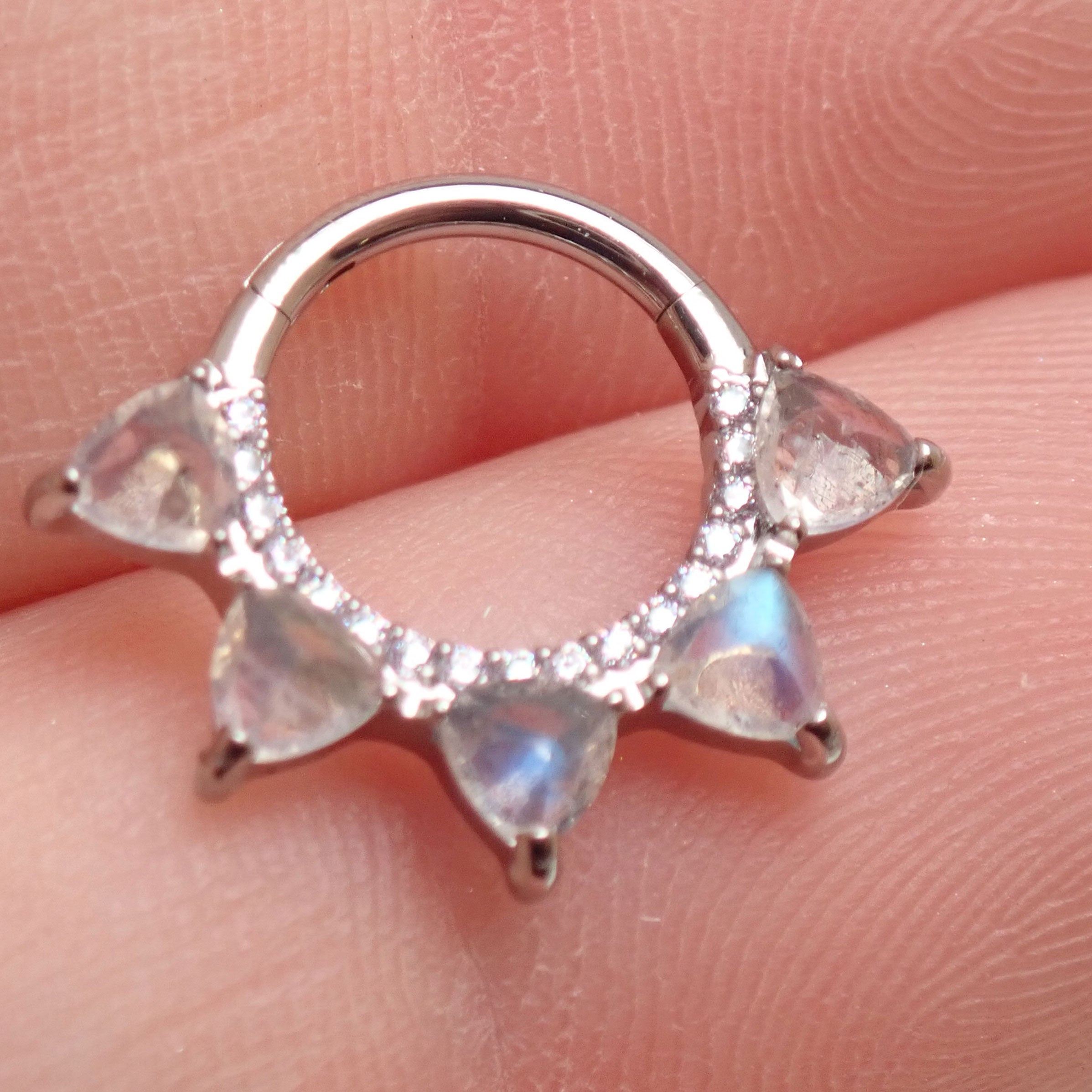 Moonstone implant grade titanium clicker jewelry in 16g, 8mm size, featuring a smooth design and secure clicker closure.