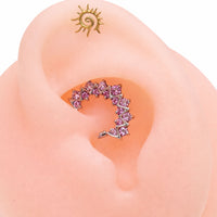 Pink CZ 16G titanium clicker jewelry for daith and septum piercings, from Body Clickers Body Jewelry.