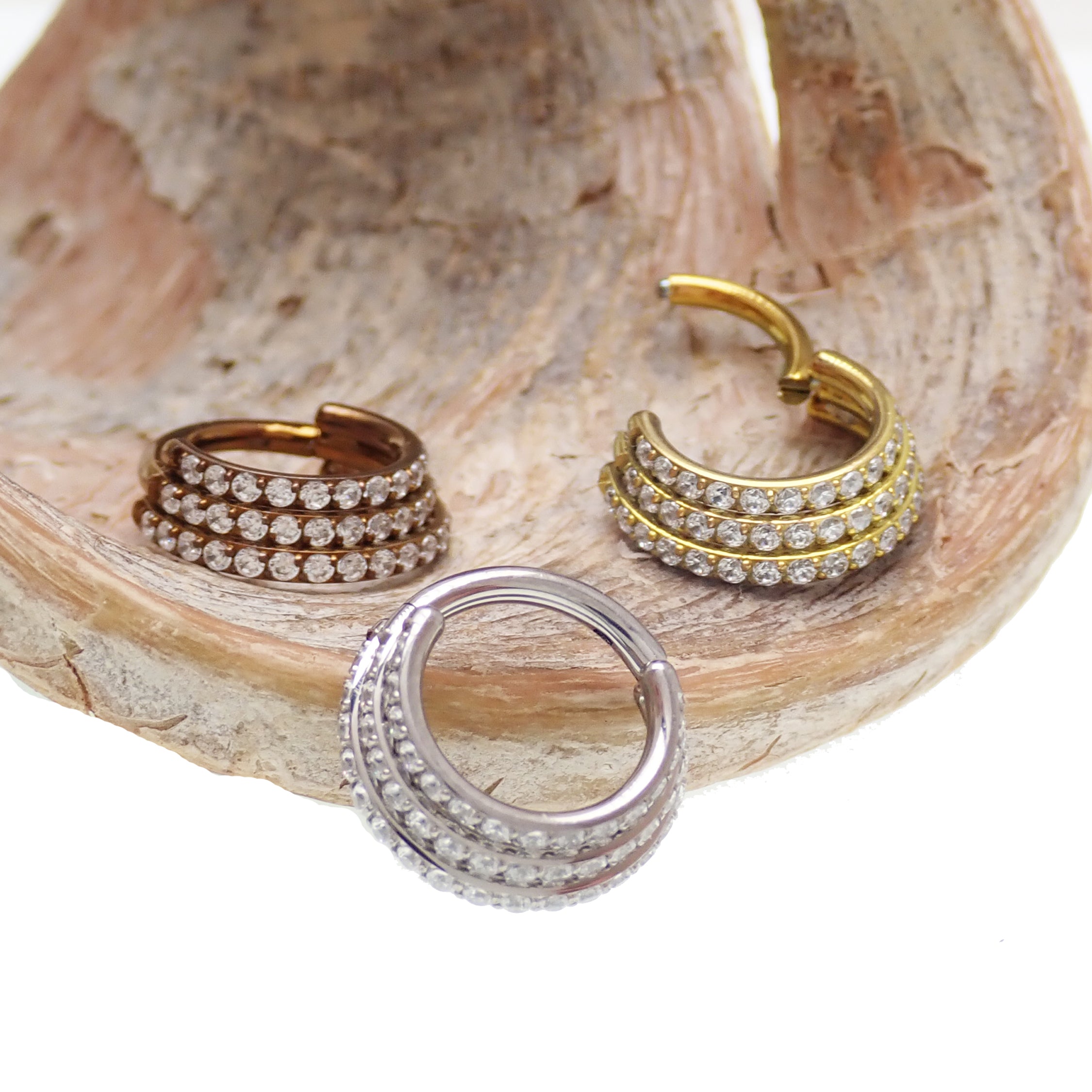 Titanium stacked clicker with CZ stones in 16g 8mm size, body jewelry featuring sparkling cubic zirconia accents