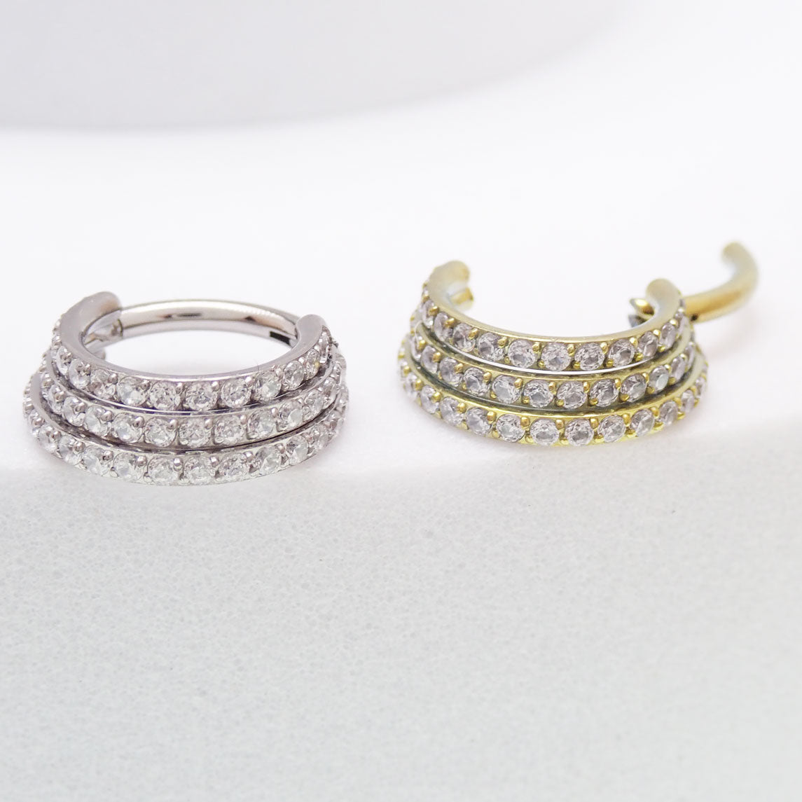 Titanium stacked clicker body jewelry with CZ stones, 8mm diameter, 16g gauge, by Body Clickers Body Jewelry.