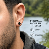 Pair of black PVD titanium disc earrings for body jewelry, 20g, from Body Clickers, featuring sleek, modern design.