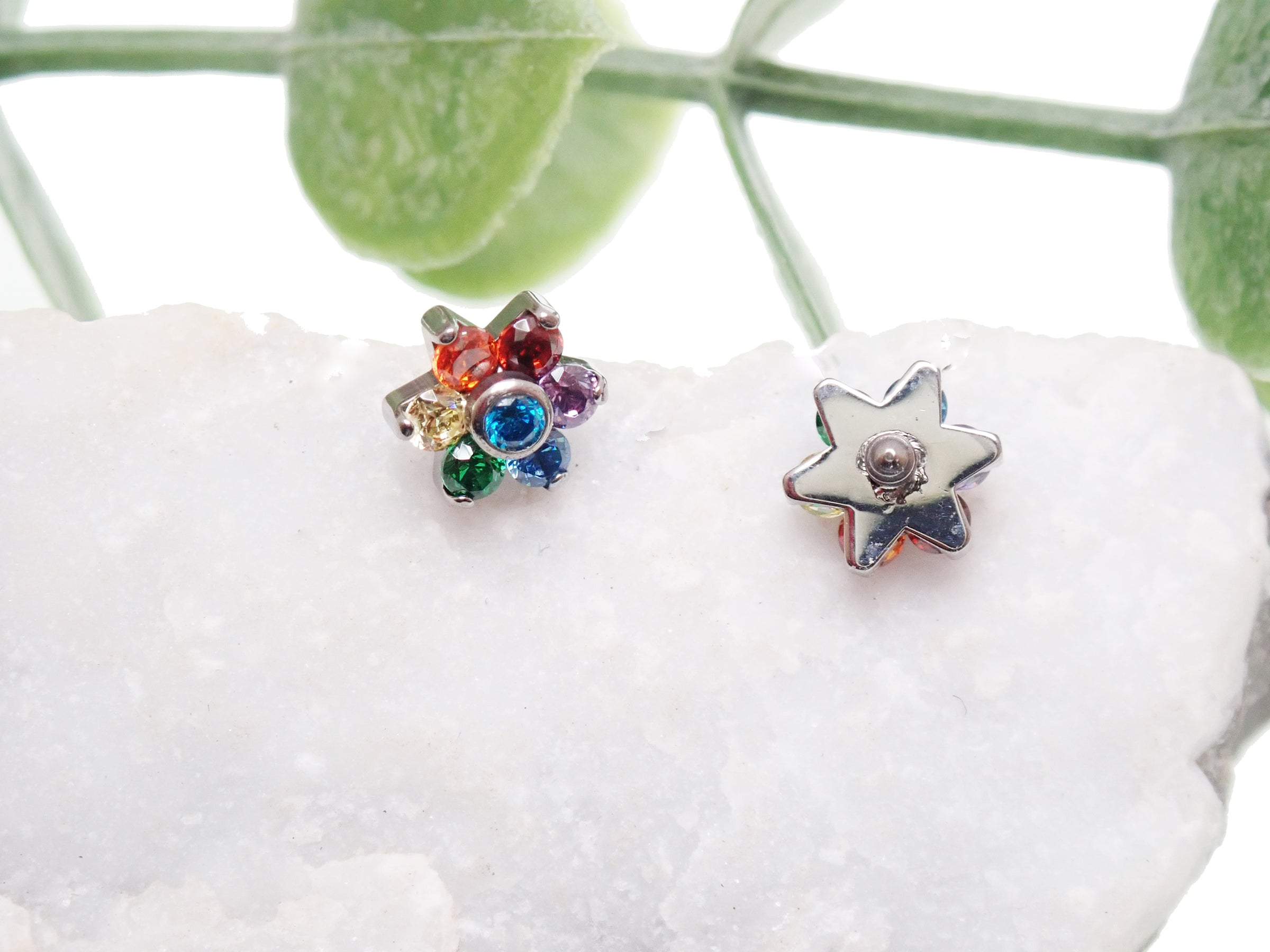 Multi CZ flower top dermal and belly jewelry in 14g, featuring a loose fit and colorful floral design for body piercing.
