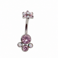 Rose Swarovski and opal flower belly ring in 14g body jewelry by Body Clickers, featuring a decorative floral design.