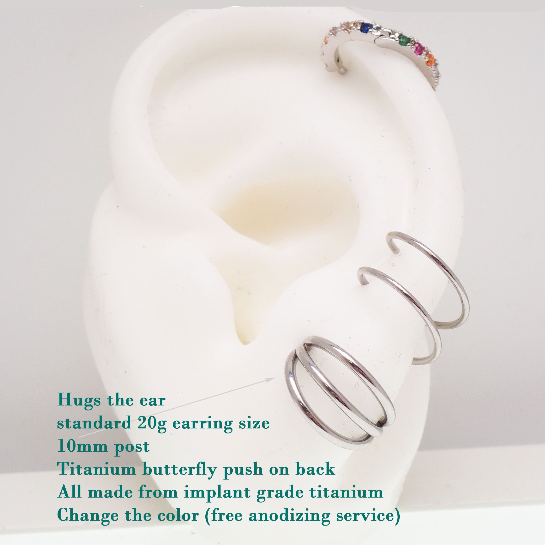 Triple hoop stud earrings made of implant titanium, hypoallergenic body jewelry with a sleek, minimalist design.