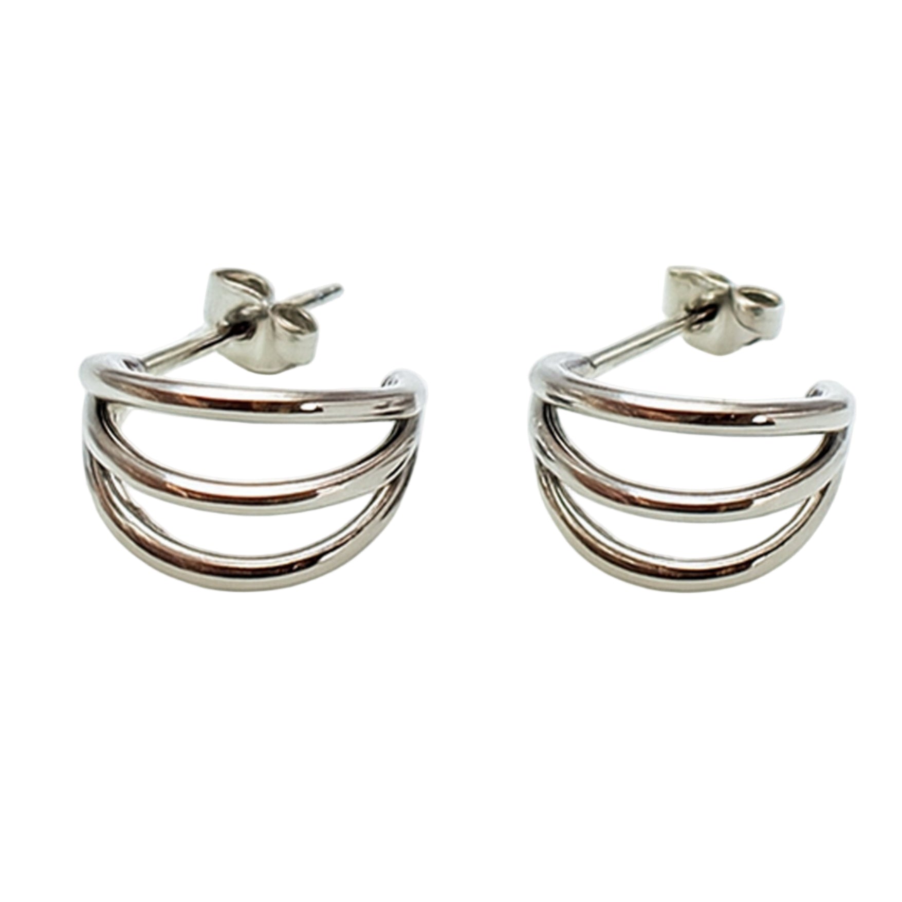 Triple hoop stud earrings by Body Clickers, hypoallergenic titanium earrings with implant-grade material and sleek design.