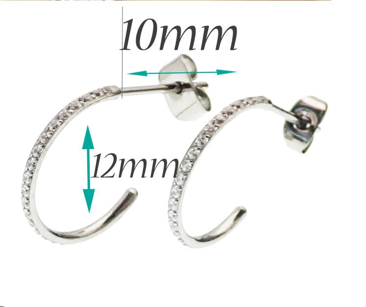 Pair of Body Clickers titanium hoop earrings with simple clear CZ stones, designed for body jewelry and implant piercing.