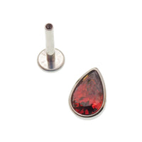 Large CZ teardrop flat back body jewelry in 14g, 16g, 18g by Body Clickers, featuring a garnet-colored teardrop design.