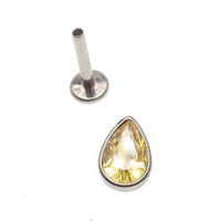 Large CZ teardrop flat back body jewelry in 14g, 16g, 18g with garnet color from Body Clickers, showing the detailed design.
