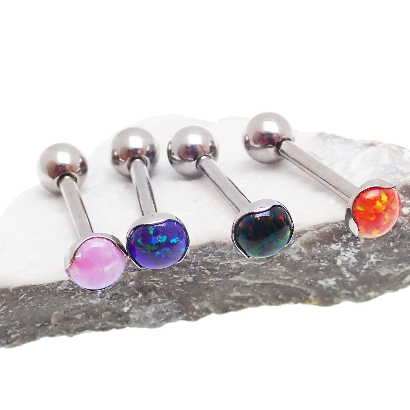 Orange gemstone 14g titanium tongue or cheek barbell piercing with a 12mm length from Body Clickers Body Jewelry.