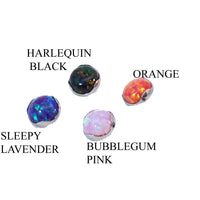 14g titanium tongue or cheek barbell piercing with orange gemstones from Body Clickers Body Jewelry, 12mm length.