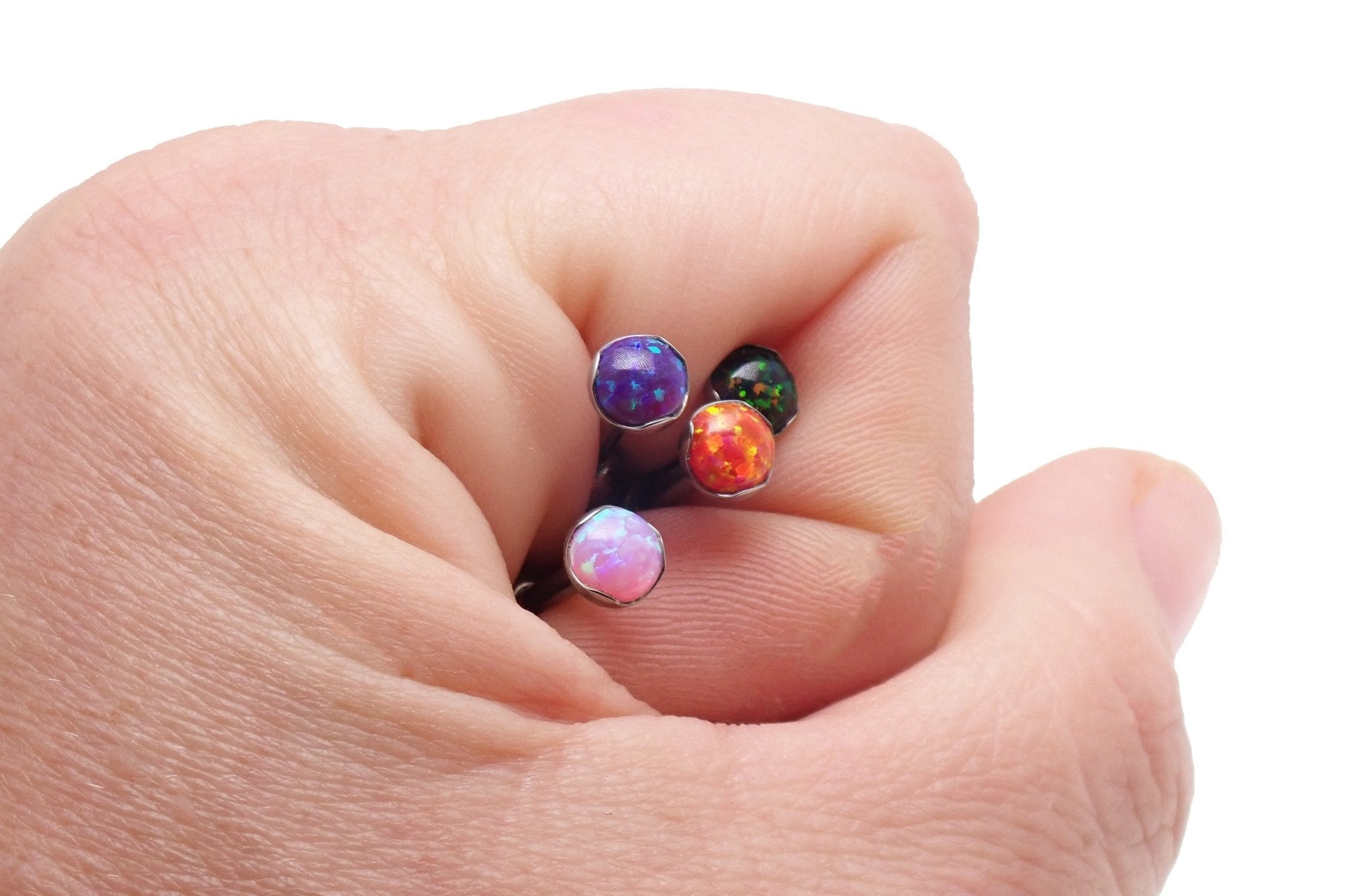 14g titanium tongue or cheek barbell piercing with orange gemstones by Body Clickers Body Jewelry, 12mm length.
