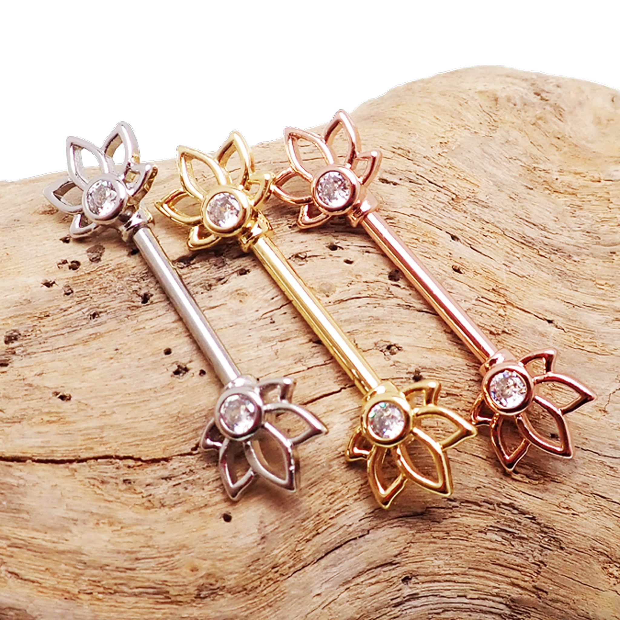 Gold, rose gold, and silver steel nipple bar jewelry by Body Clickers, 14g, featuring a sleek and polished body jewelry design.