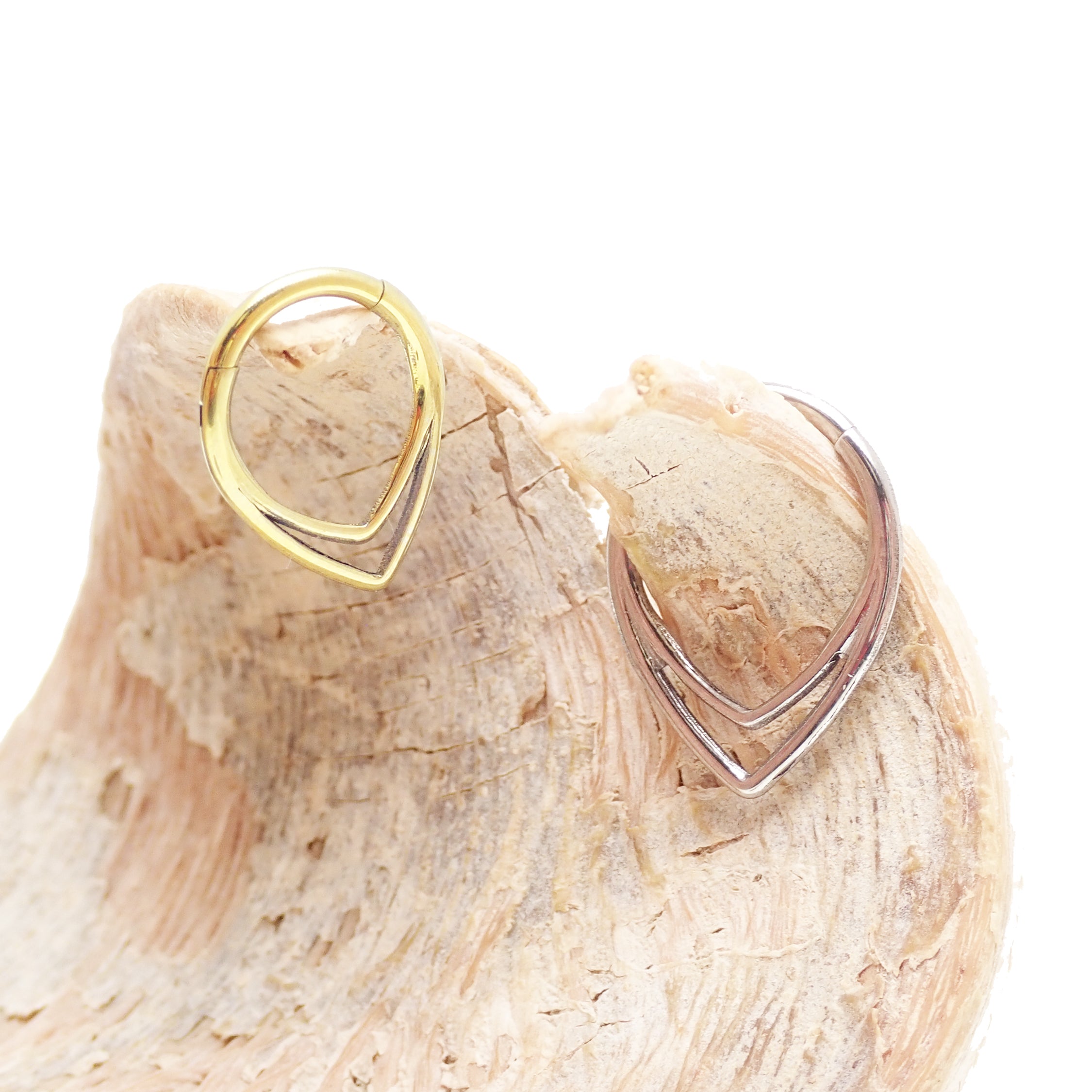 V-shaped hinged clicker body jewelry in 16 gauge, featuring an 8mm size and sleek V design by Body Clickers.