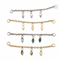 Titanium implant body jewelry chain with moss agate and moonstone charms, featuring natural stone pendants and intricate design.