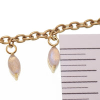 Body Clickers implant titanium body jewelry with moss agate and moonstone charms, featuring a natural stone piercing chain design.