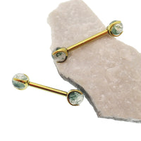 Moss Agate nipple barbell piercing by Body Clickers Body Jewelry, 14g and 12g, with 10mm bar and 3.8mm moss agate gemstone.