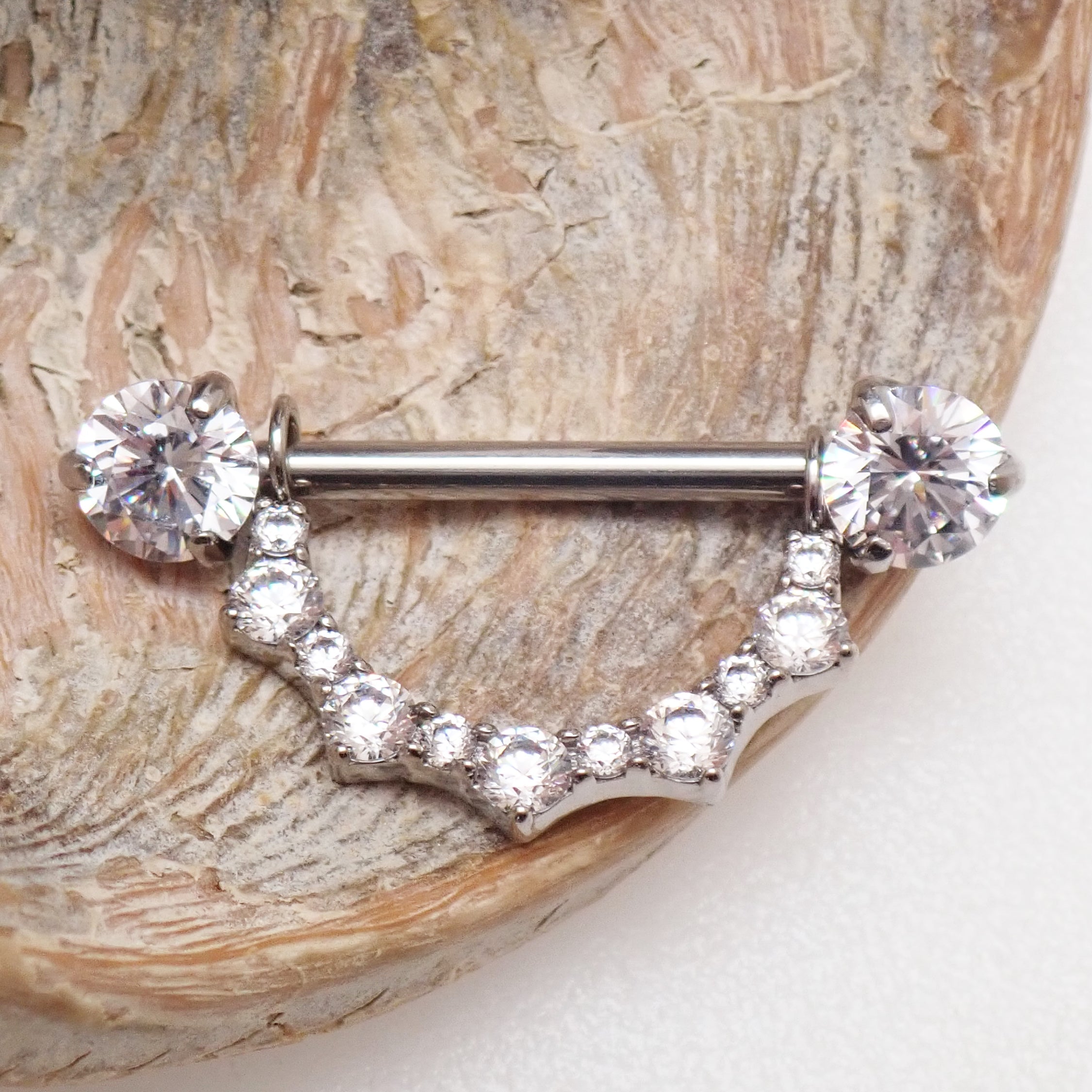 Titanium CZ shield nipple barbell by Body Clickers Body Jewelry with push-fit ends, available in 14mm and 16mm sizes.