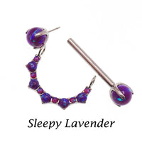 Titanium implant nipple jewelry with peacock blue and pink opal cluster shield, push-fit 14mm nipple barbell with claw set ends.