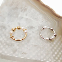 Sterling silver nose hoop with pearl, 18g, 8mm diameter, Body Clickers body jewelry in natural setting