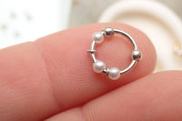 Sterling silver pearl nose hoop by Body Clickers, 18g gauge with 8mm diameter, featuring a sleek and elegant design.