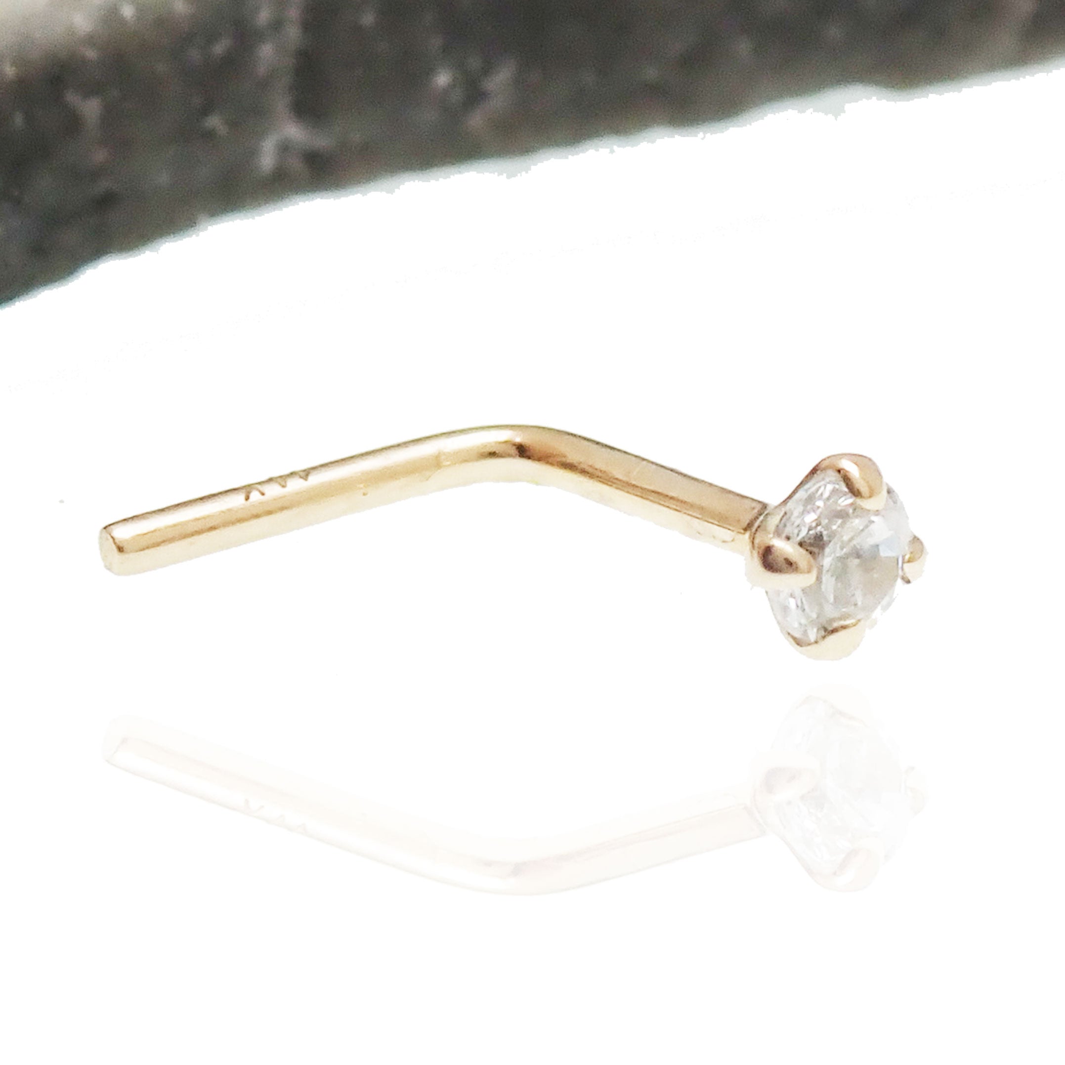 14K nose piercing stud with 2mm cubic zirconia from Body Clickers Body Jewelry, featuring a sleek nose stud design.