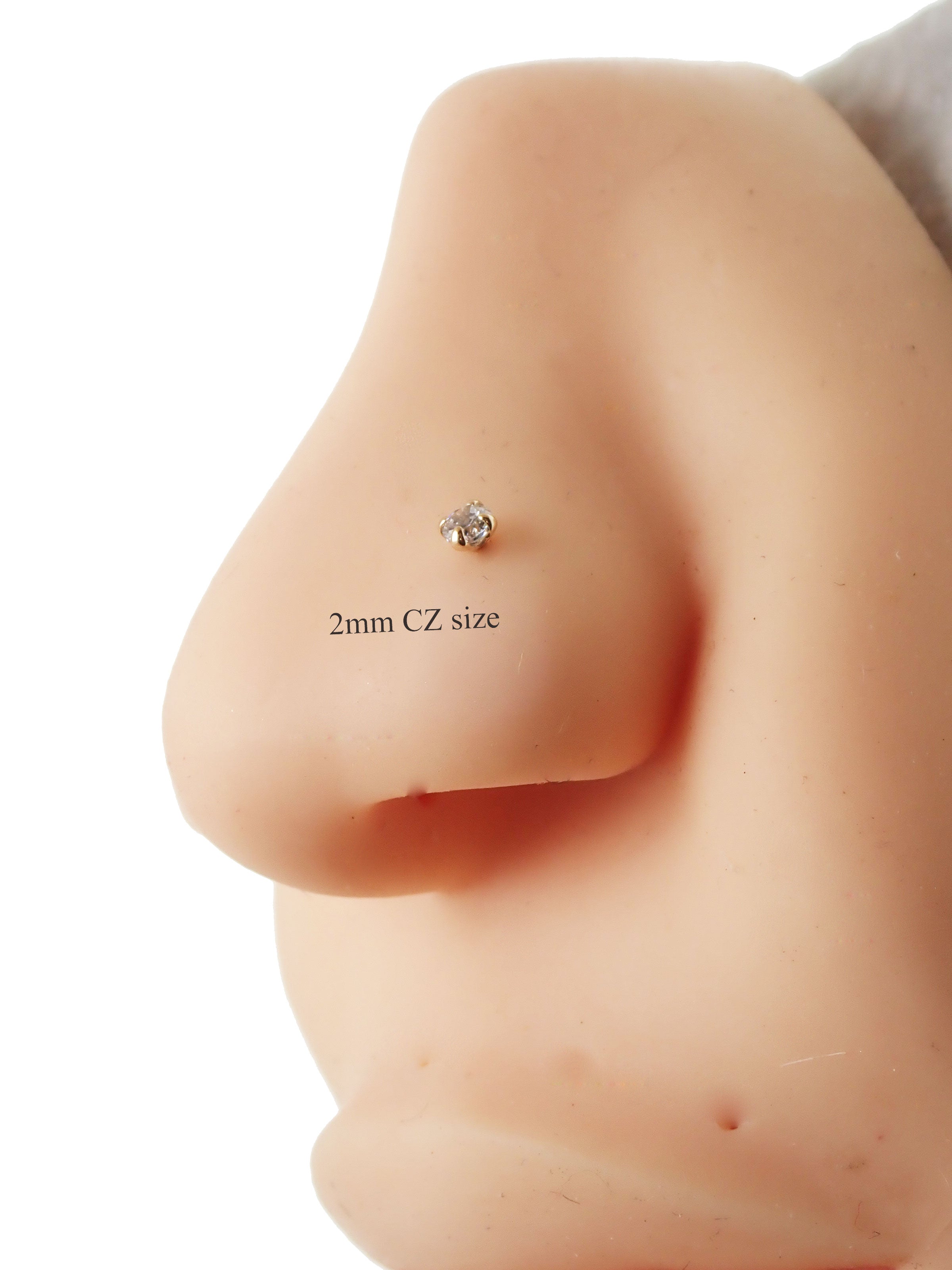 14K nose piercing stud with a 2mm cubic zirconia from Body Clickers Body Jewelry, featuring a sleek, polished design on a white background.
