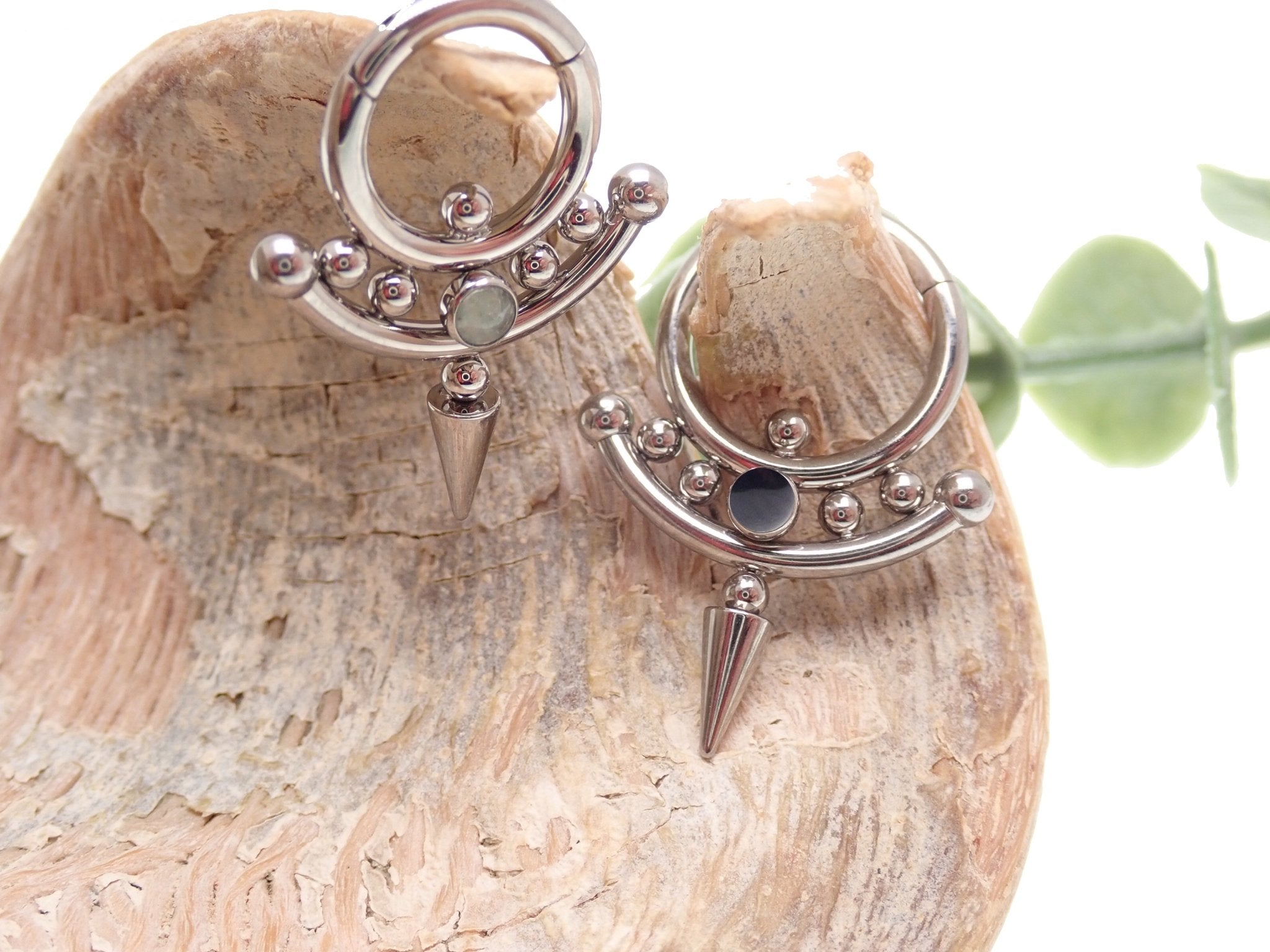 Onyx or Icy Jade Spike Titanium Clicker body jewelry in 14g or 16g, featuring an 8mm stone and modern design.