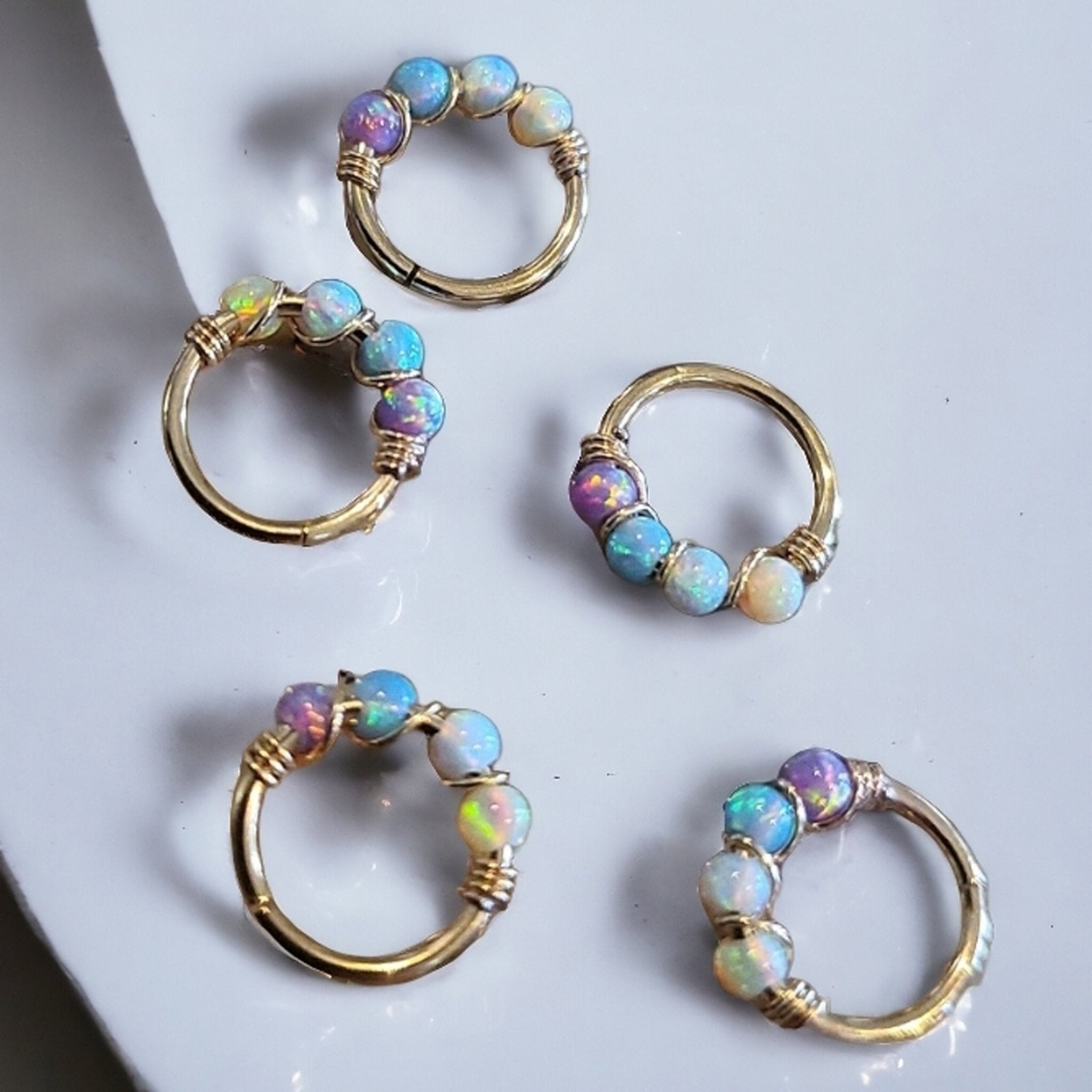 Sterling silver fire opal nose and ear hoop, 8mm diameter, Body Clickers Body Jewelry featuring vibrant gemstone and sleek hoop design.